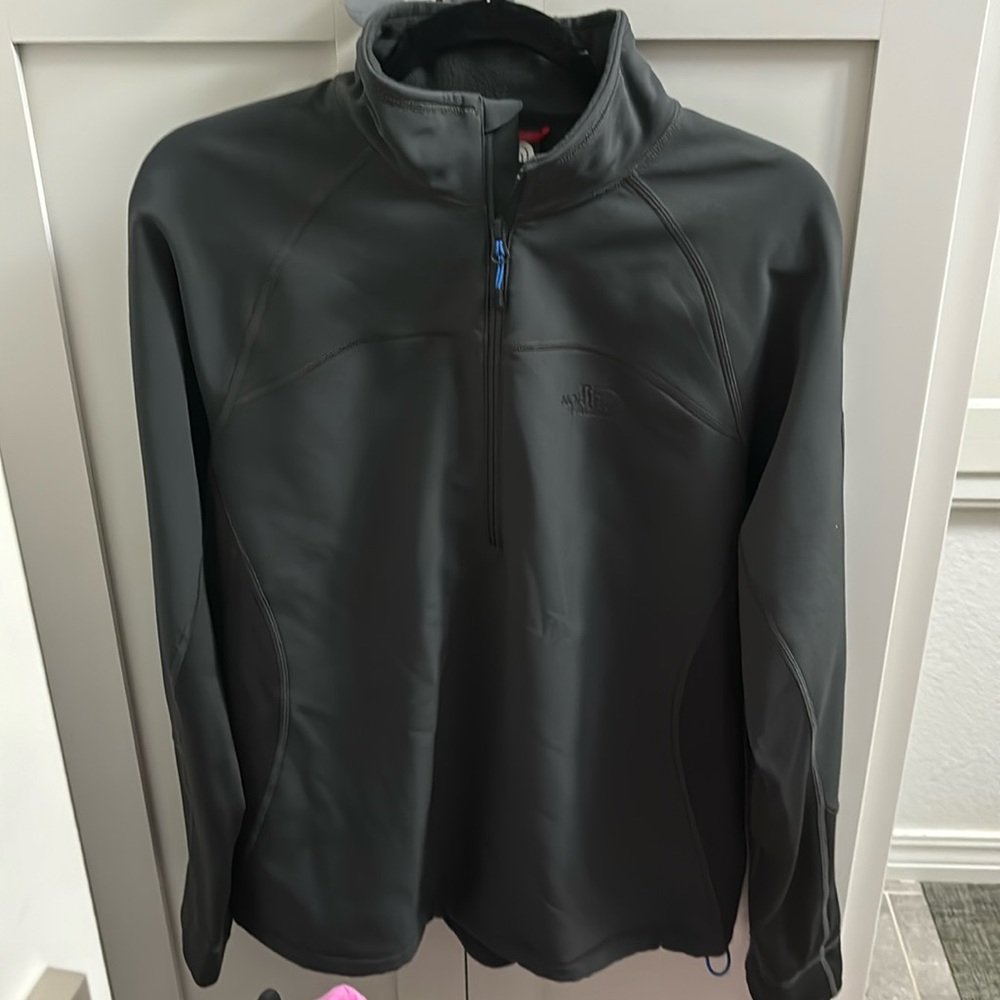 Charcoal Gray North Face half zip with drawstring bottom. Men’s Size M.